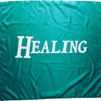A turquoise flag with the word 'healing' in white